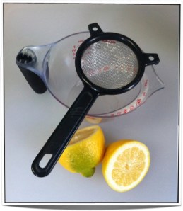 The lemon juicing rig. The strainer is to catch and seeds or errant clumps of pulp.