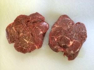 Raw steaks, unpacked.