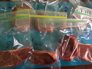 Chuck tender steaks, labeled and read to take a bath.