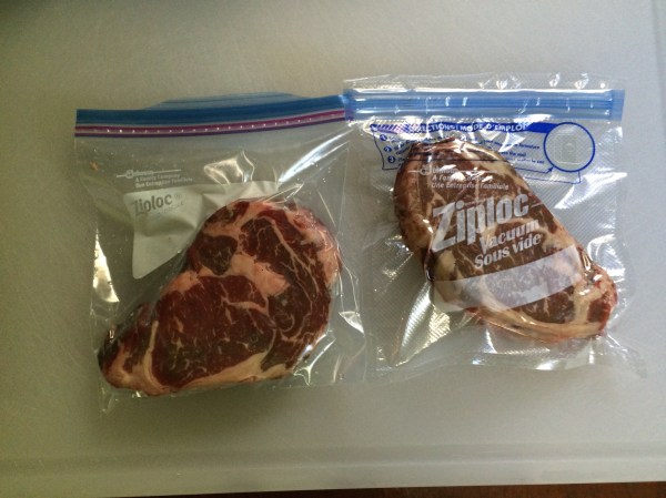 Steaks sealed inside their zip-top bags. Standard freezer bag (left) and Vacuum sealed bag (right).