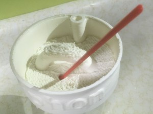 Shows stir stick partially blocking siphon inlet.